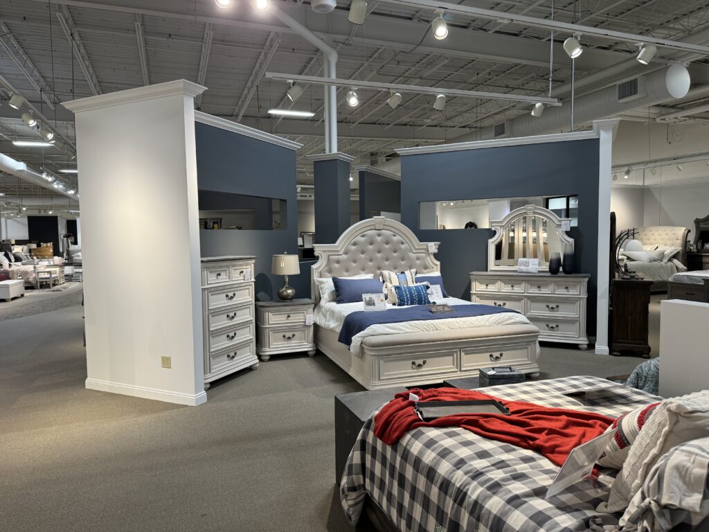 White bedroom set at furniture store