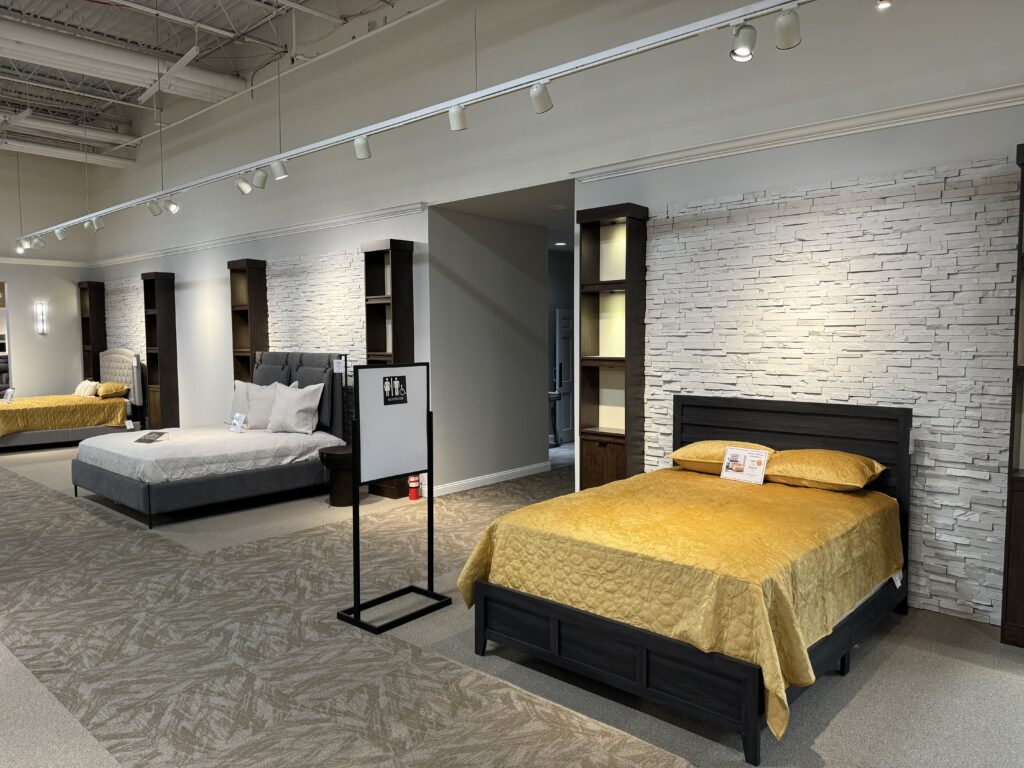 Line of beds at furniture store