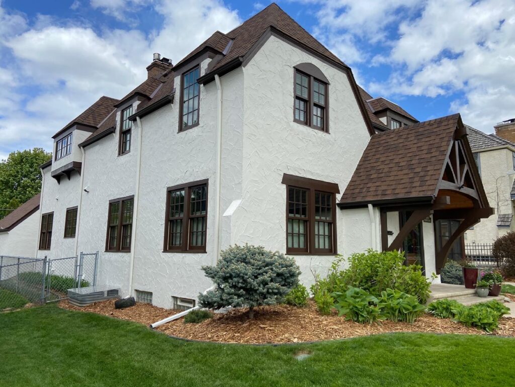 White Minneapolis home with brown trim
